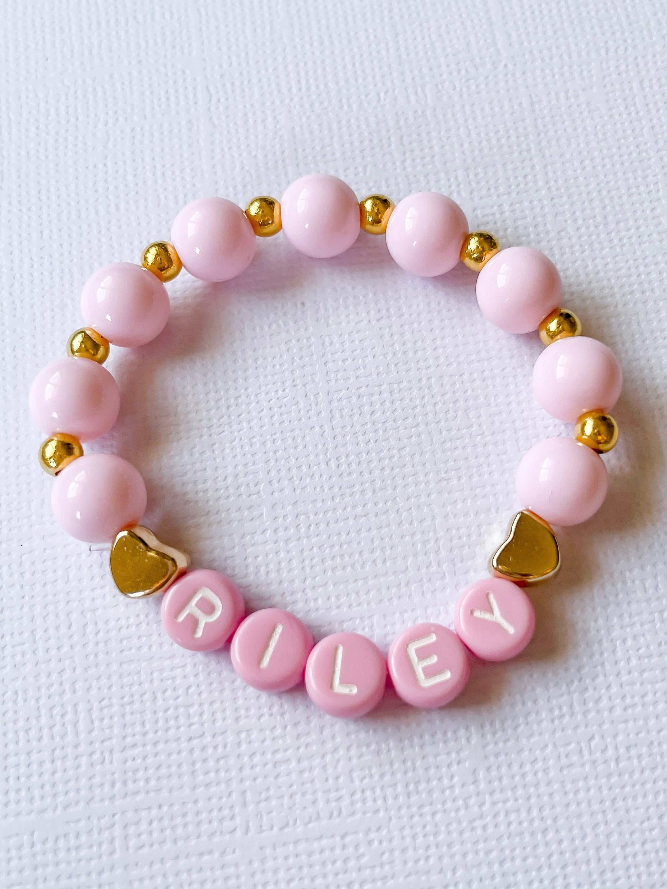 Gold name store bead bracelet